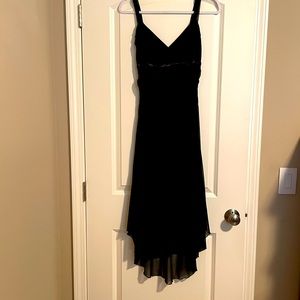 Black cocktail dress. Size L but fits like a M.